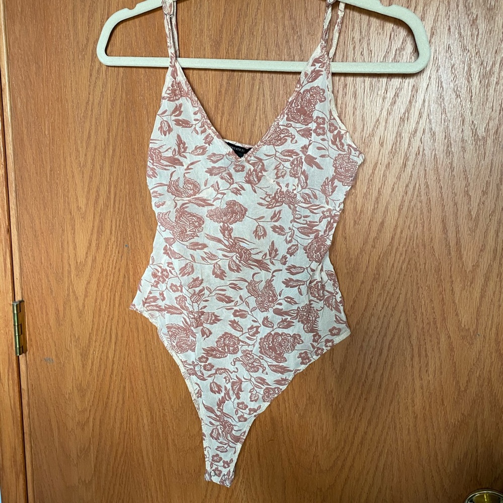 Mesh and lace body suit